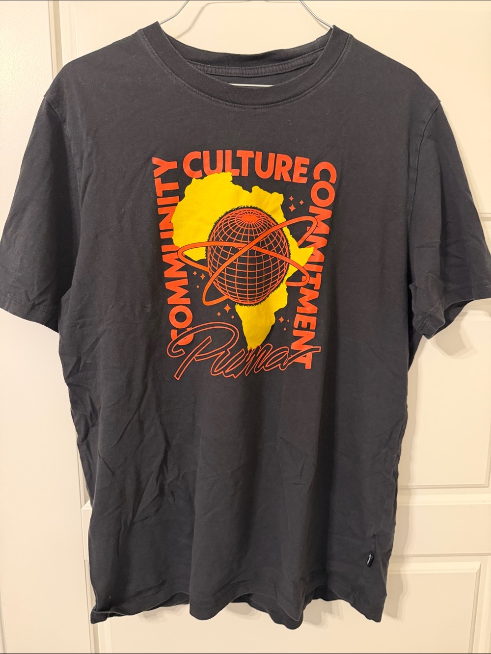 Puma Black Tee with Yellow Africa & Orange Graphic